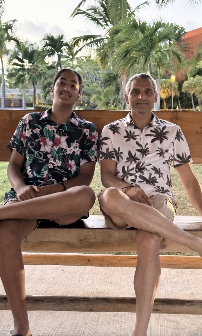 Ranveer and his father Gagan sitting together outdoors